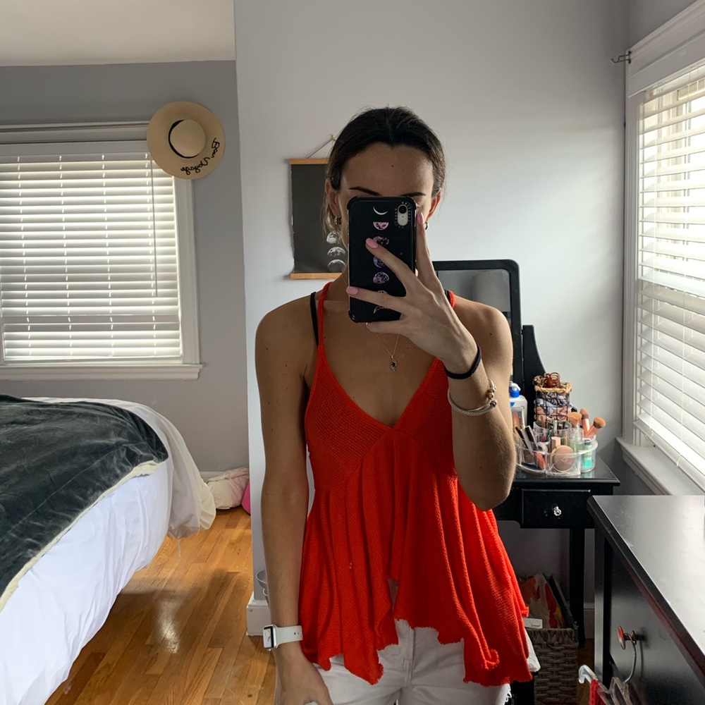 Urban Outfitter’s orange/red flowy top